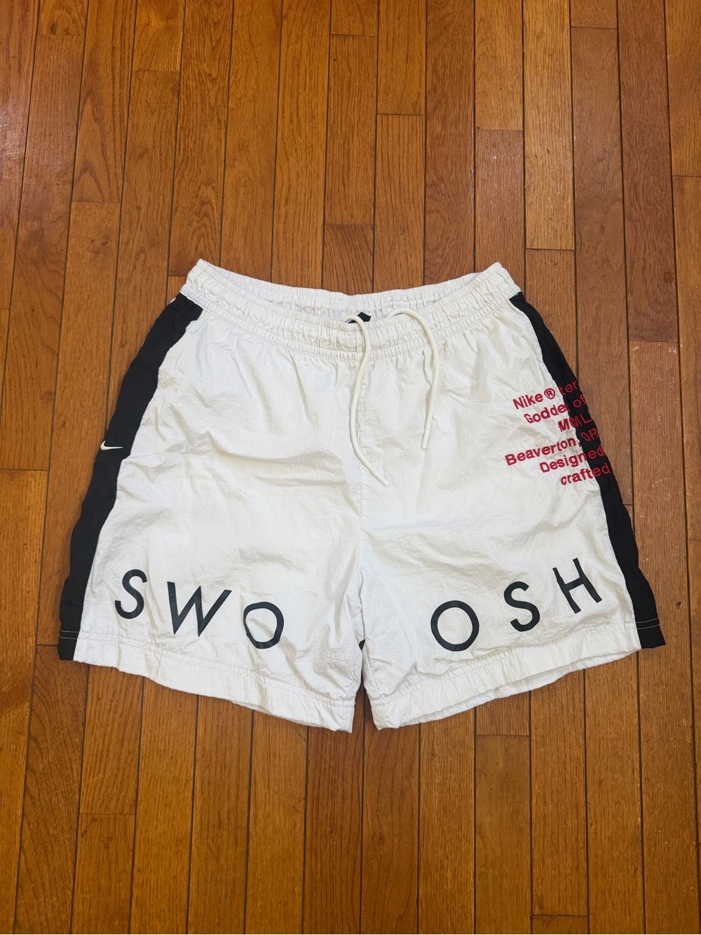 Nike White Swim Trunks with Black Panels and Red Script